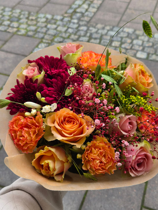 Mixbukett oransje og rosa